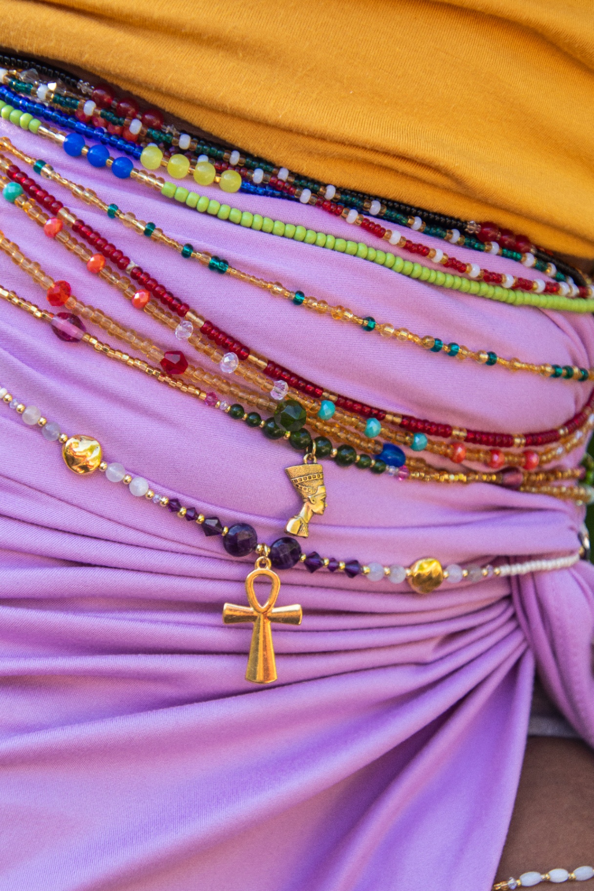Handcrafted waist beads adorning a woman's waist